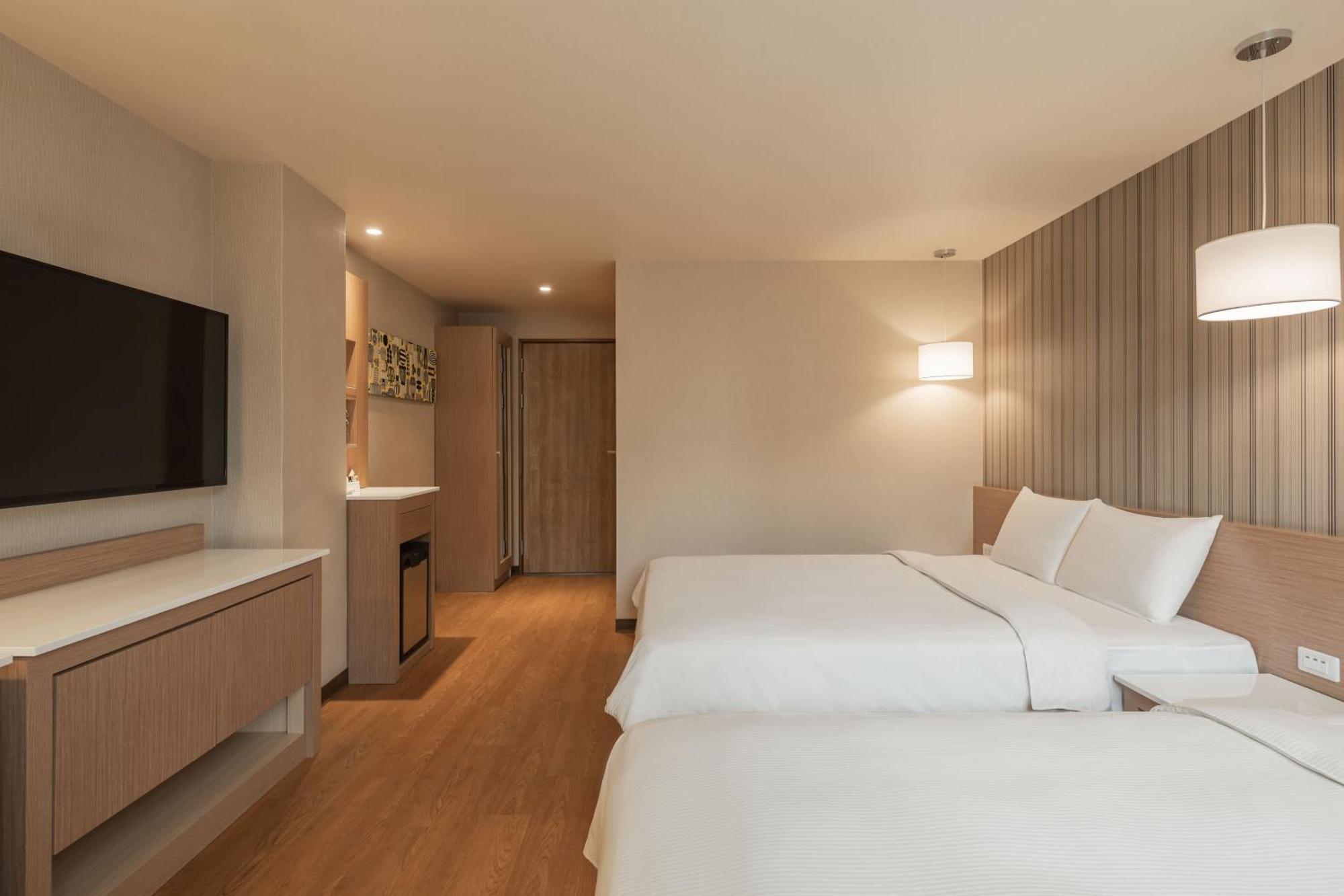 Kindness Hotel-Jue Ming Kaohsiung Quarto foto